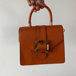 PETITE ORANGE BAG FROM ALDO
